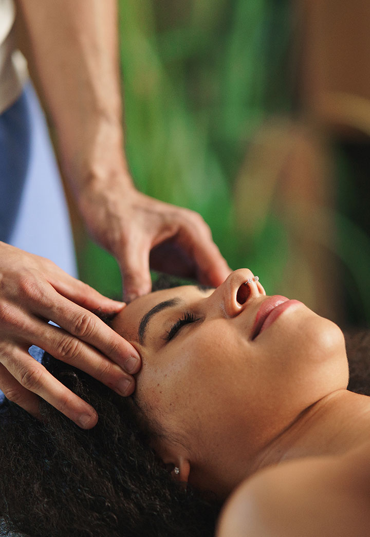 Relaxing head massage at Peanut's Massage & Wellness, promoting relaxation and rejuvenation through expert hands-on therapy.